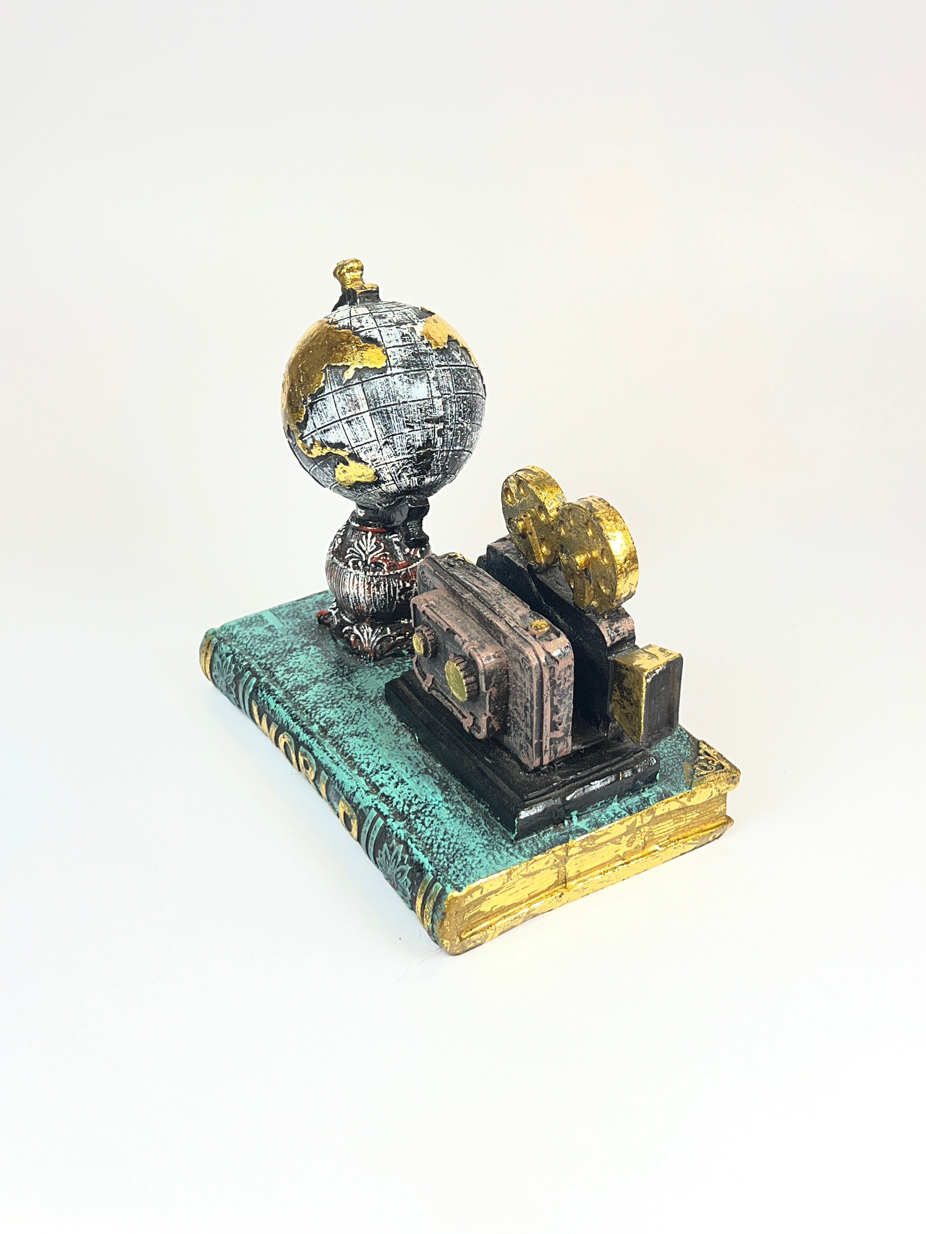 Vintage Film & Travel Decor Statue - Globe and Movie Camera on "WORLD" Book