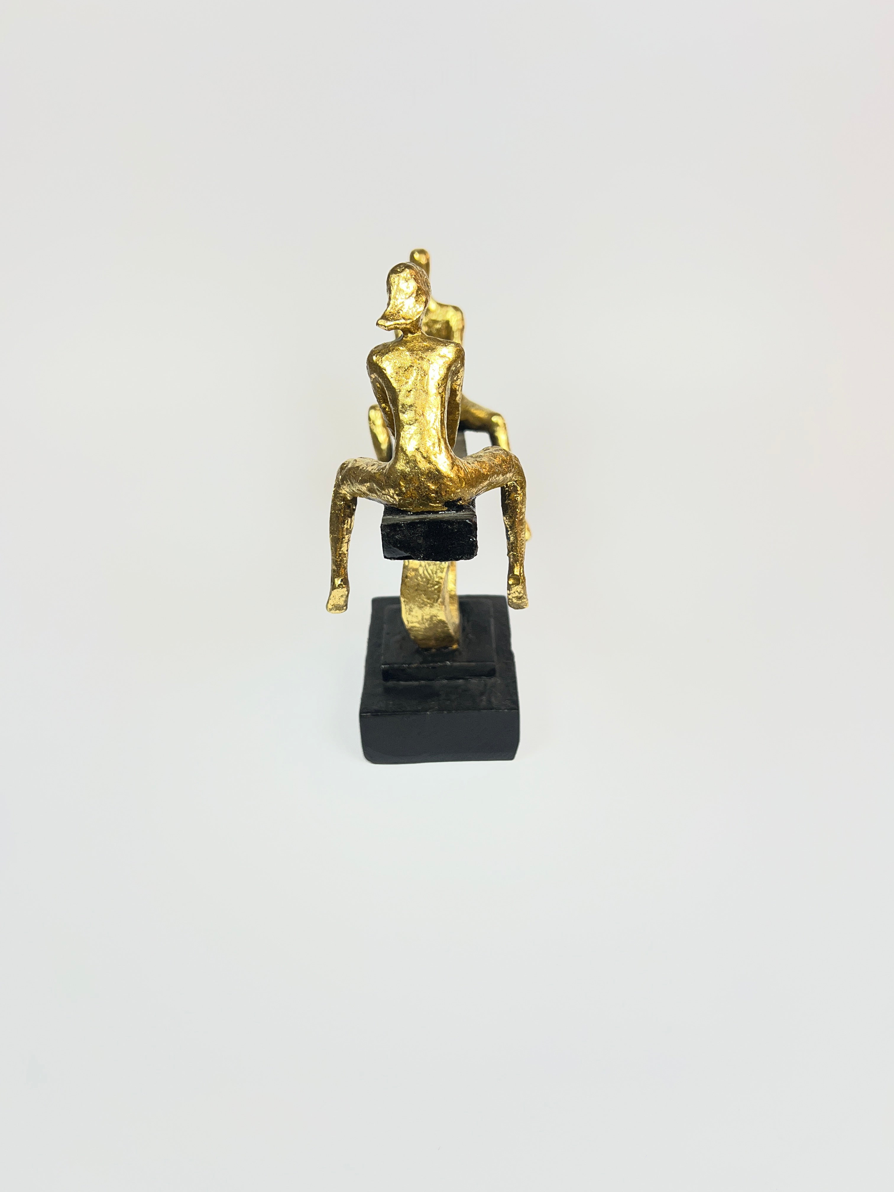 Abstract Figures on Seesaw Sculpture | Gold and Black Fiber Art